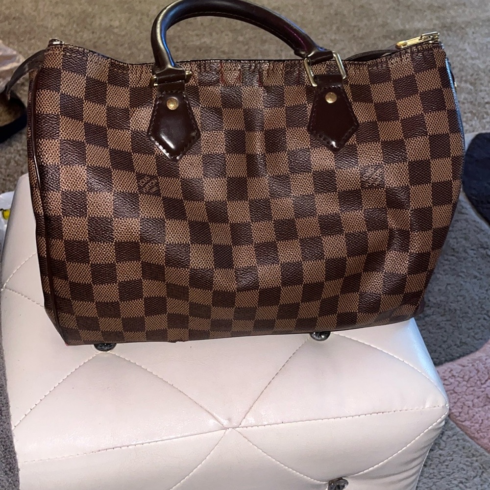 Louis Vuitton Brown Satchel with Structured Silhouette